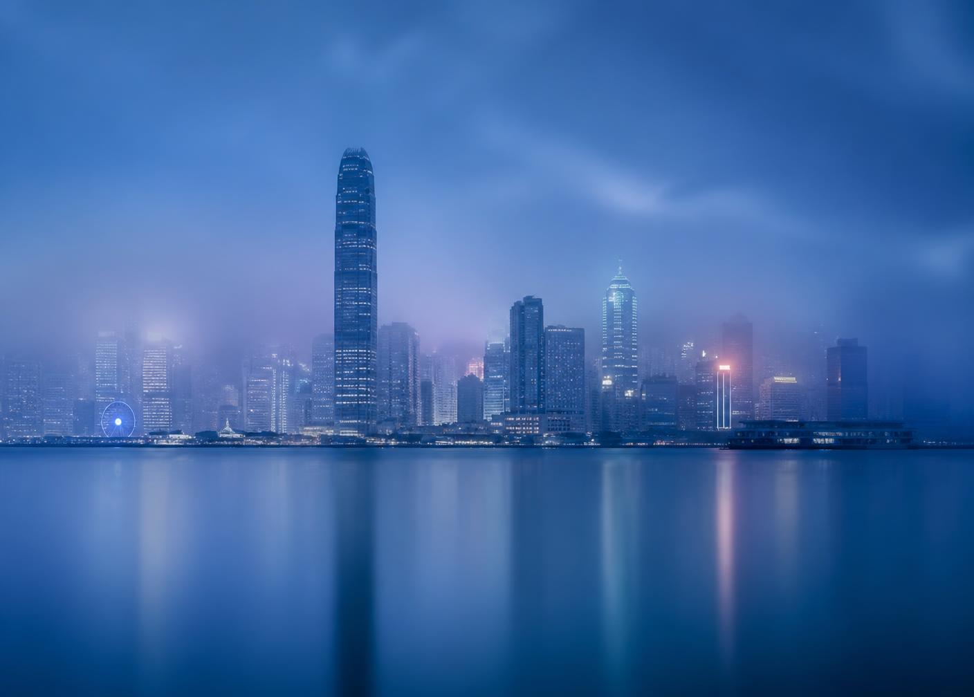 Hong Kong harbour skyline at blue hour